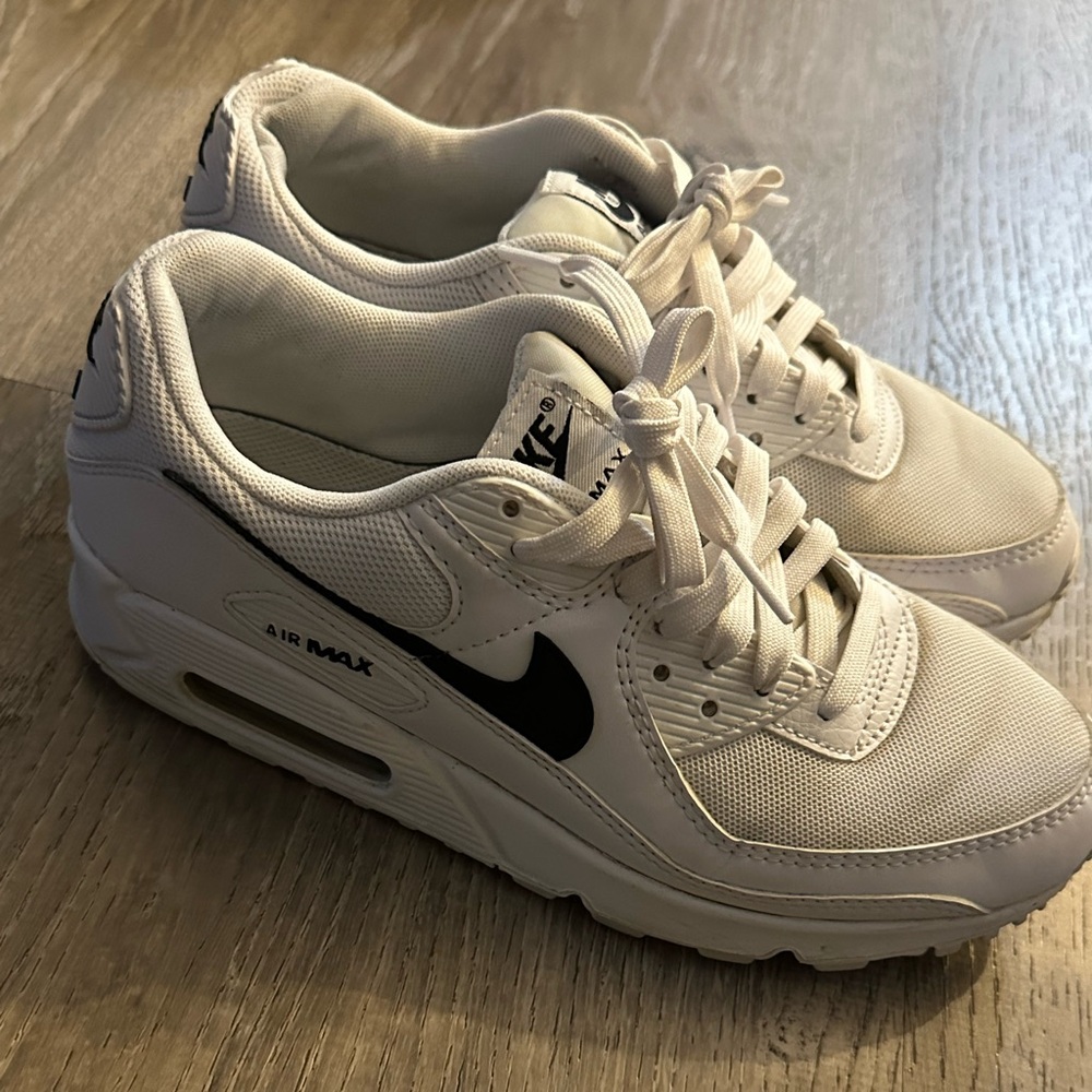 Nike White Sneakers with Black Logo